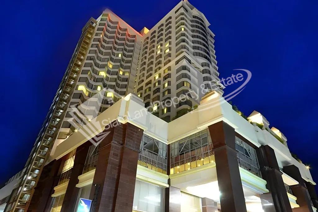 Grand City Hotel Resort majestic building exterior view at night