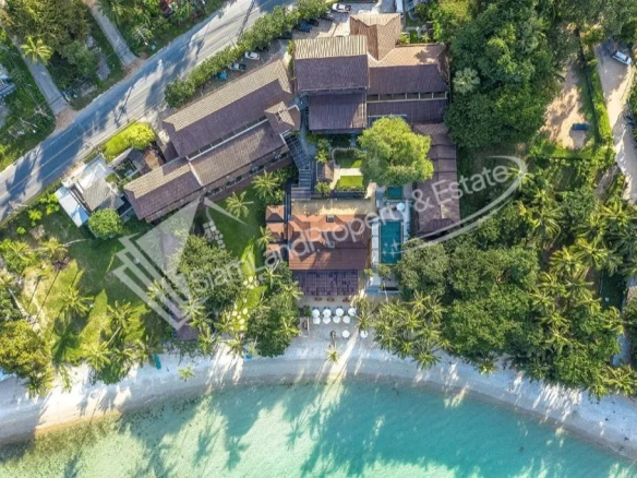 Impiana Samui stunning aerial view showcasing the tropical beachfront resort and crystal clear ocean