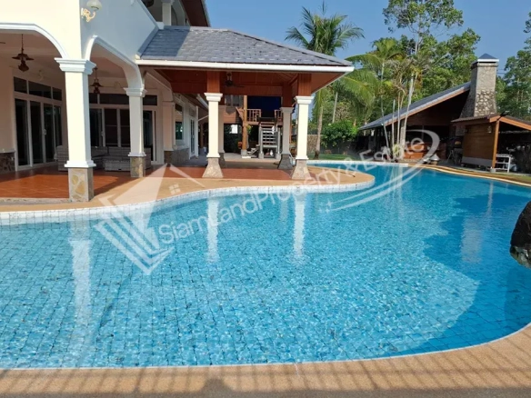Luxury pool villa mansion poolside exterior