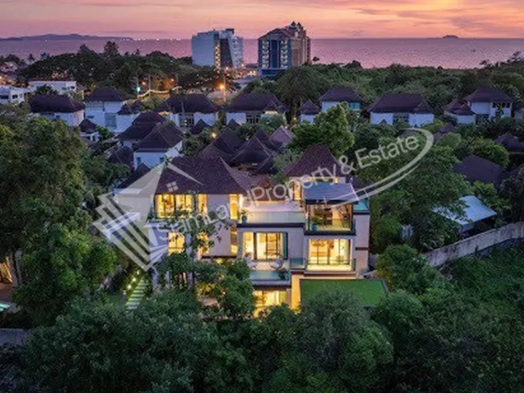 Luxury premium pool villa aerial twilight