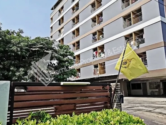 Veerach Place Apartment main low-rise residential building exterior featuring a secure gated front entrance