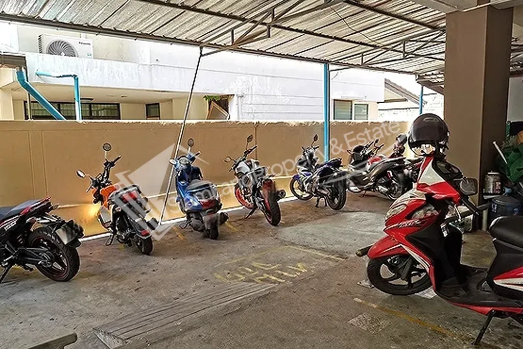 Convenient ground floor covered motorcycle parking spaces dedicated for apartment residents
